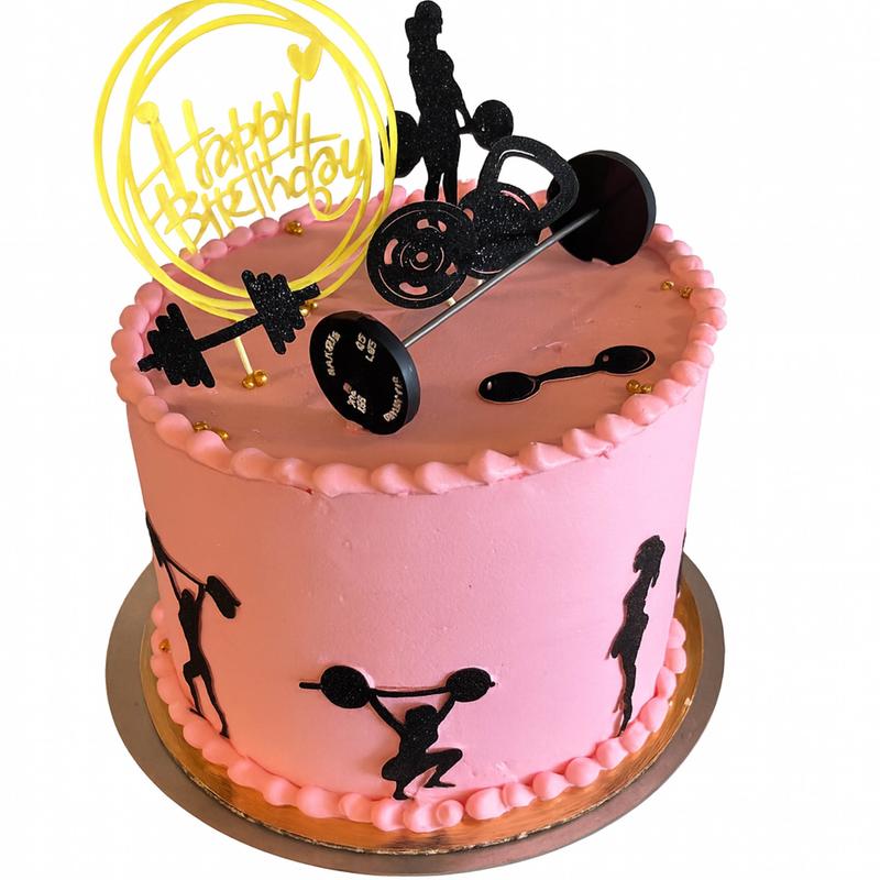 Pink buttercream cake with a piped pearl border, black silhouettes of weightlifters around the sides, and toppers of barbells, dumbbells and a gold Happy Birthday hoop.