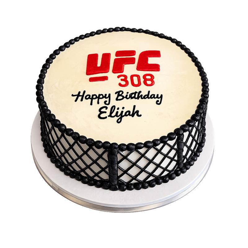 Round ivory cake piped with a black cage-fence pattern around the sides, a red UFC 308 logo on top and Happy Birthday Elijah in black script.